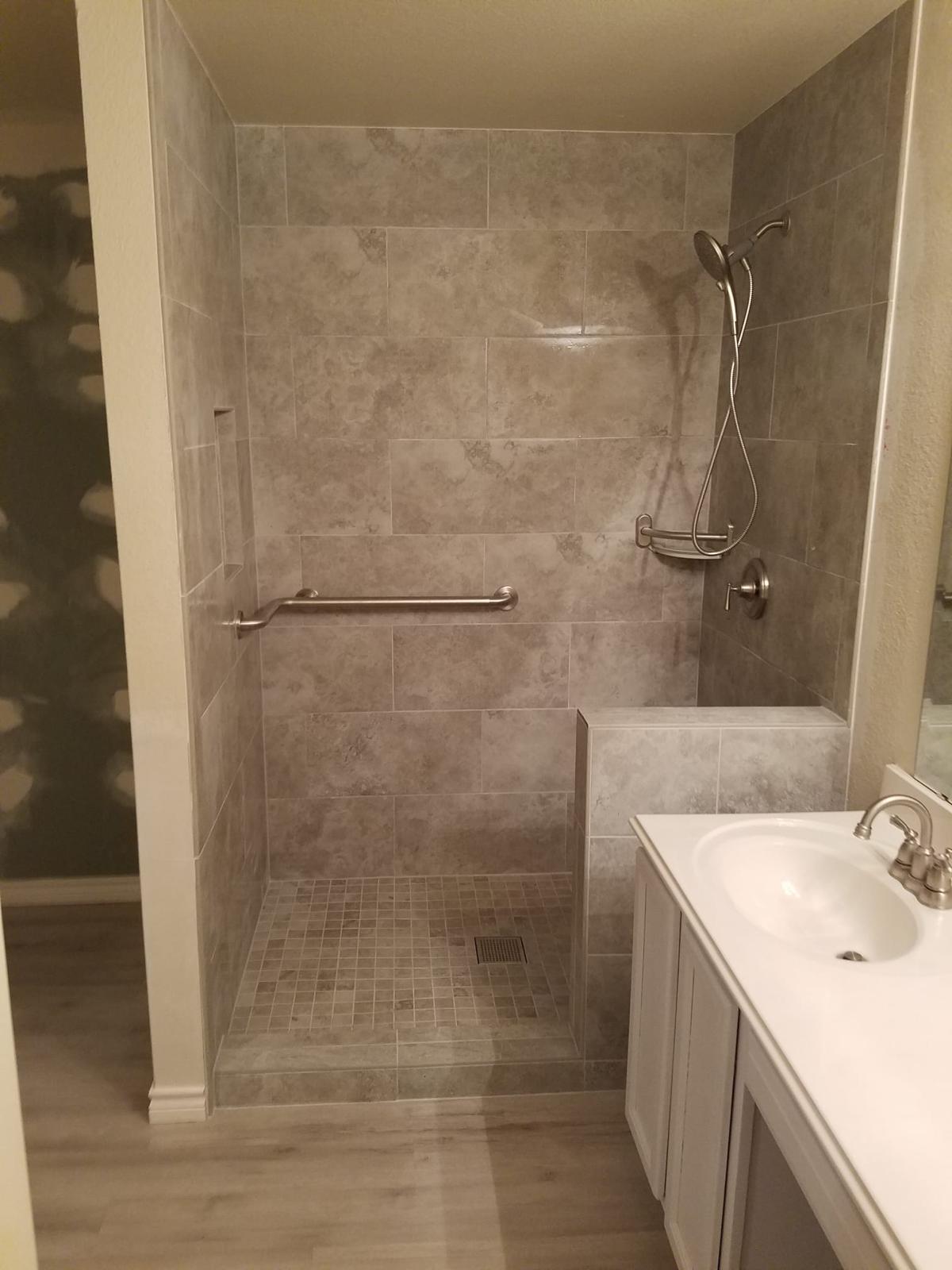 Completed tub-to-shower and walk-in shower project view 4