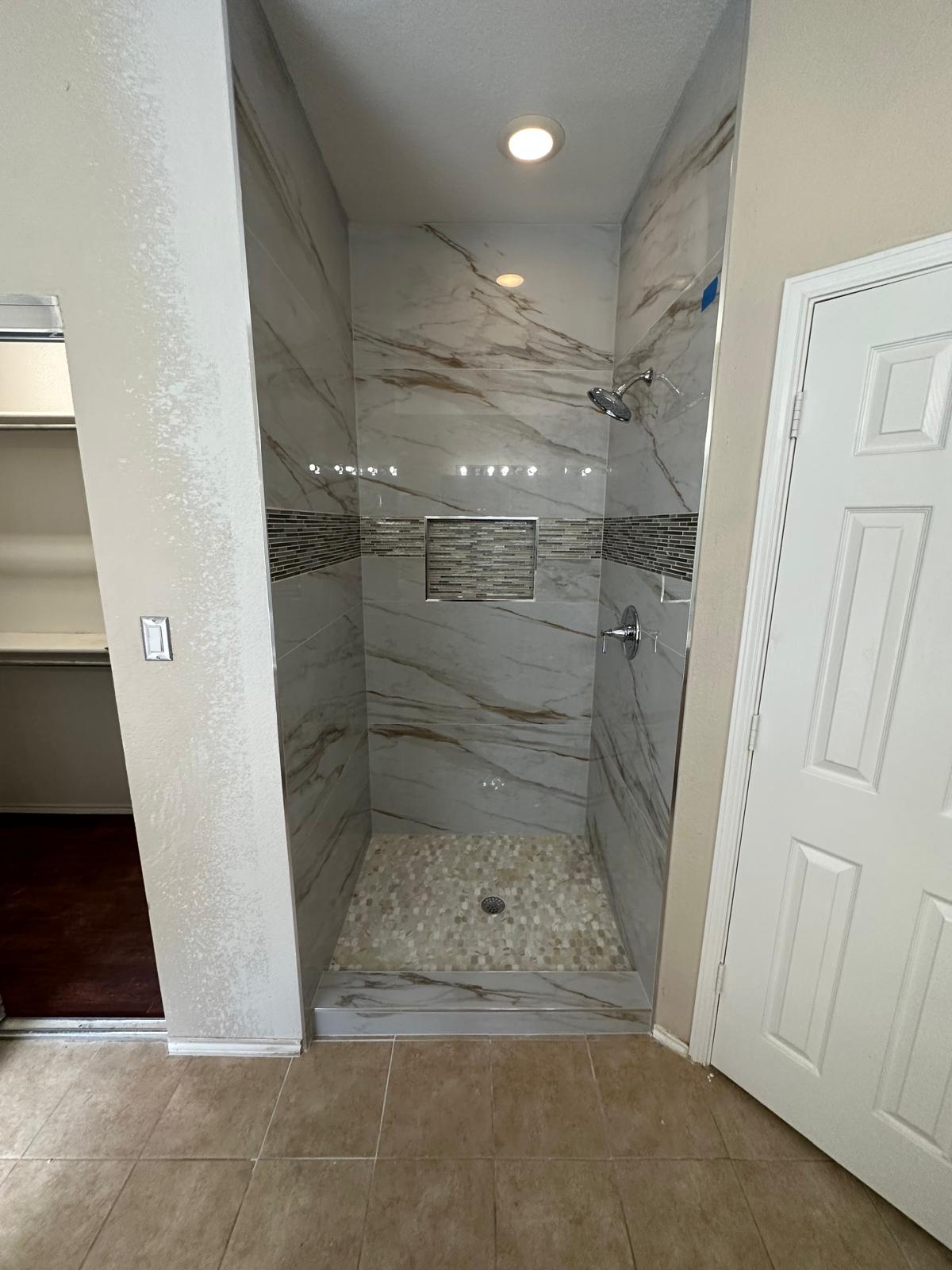 Completed tub-to-shower and walk-in shower project view 15